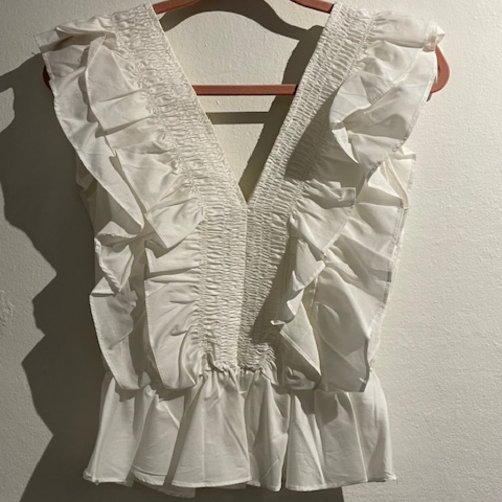 Pants Store White Sleeveless V-Neck Ruffle Top